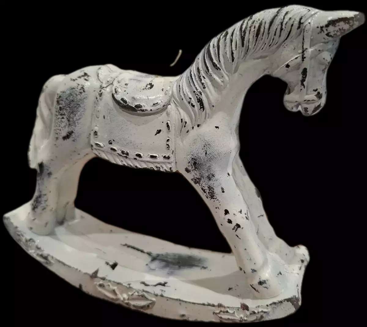 Cheval à bascule en bougie