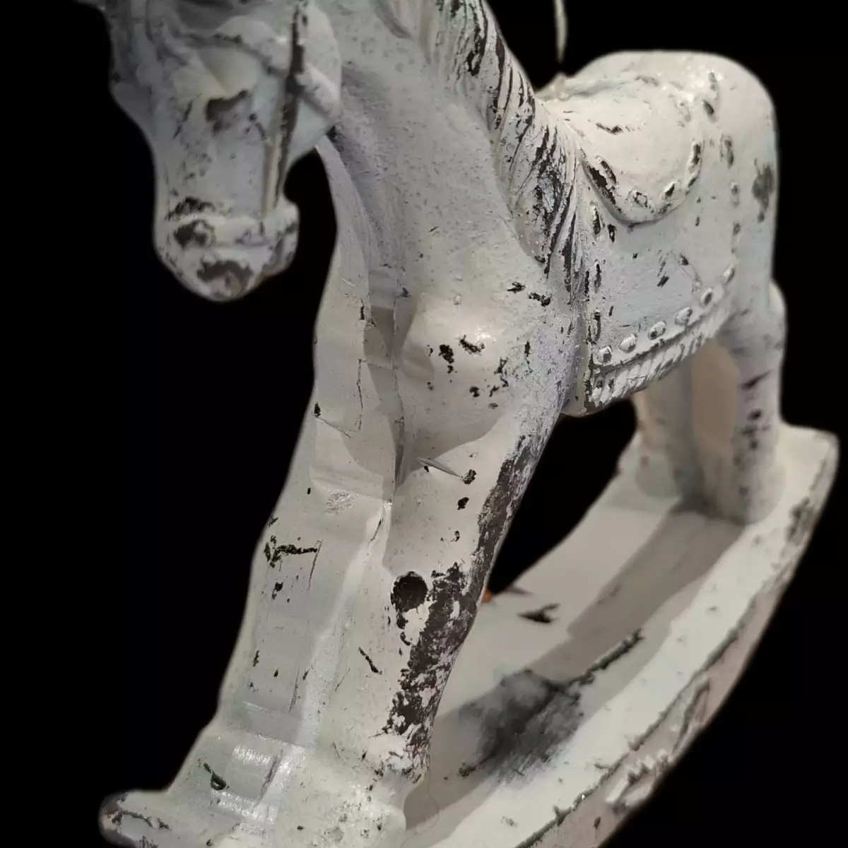 Cheval à bascule en bougie