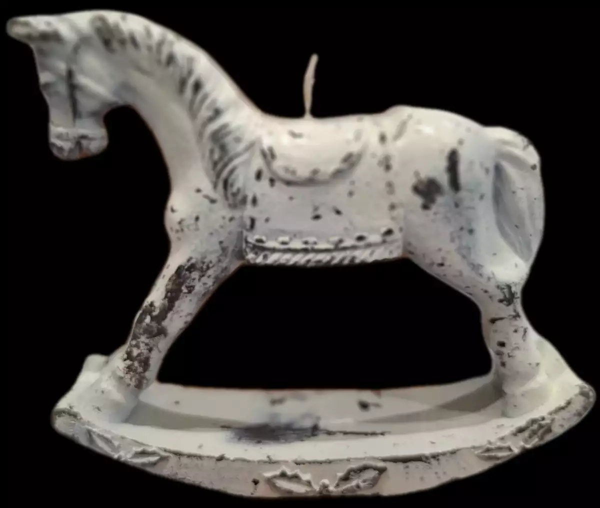Cheval à bascule en bougie